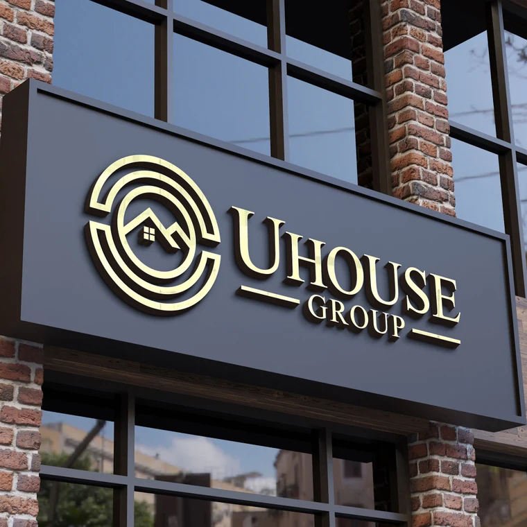 Exterior storefront featuring gold-finished Custom Fabricated Letters, showcasing our expertise in premium Architectural Metal Signage and Stainless Steel & Brass Signs.