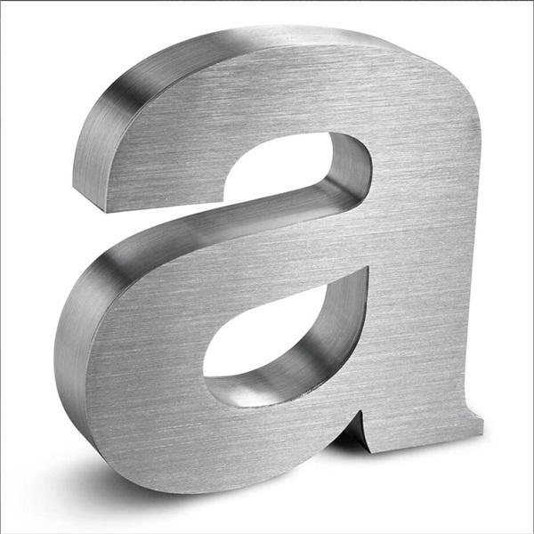 Precision-crafted brushed stainless steel 3D letter, representing our high-quality Custom Fabricated Letters within our range of Architectural Metal Signage and Stainless Steel & Brass Signs.