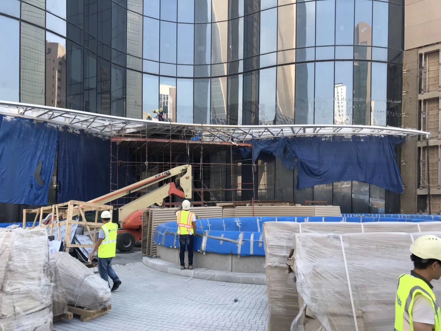 curved-metal-entrance-canopy-construction-nbk