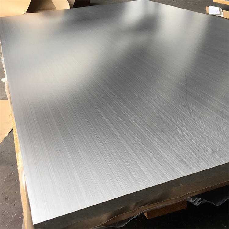 Close-up of custom aluminum sheets with a premium brushed hairline finish for interior decoration.
