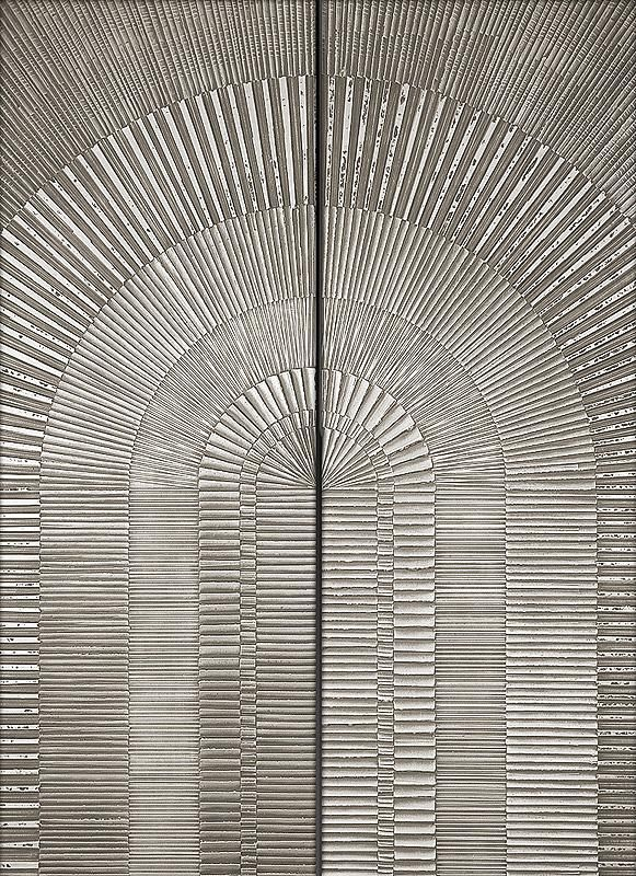 Radial fluted pattern on aluminum-skinned custom bonded metal sheets for modern architectural cladding.