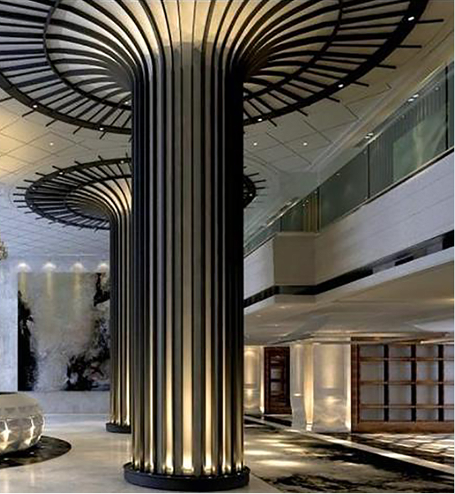 Stainless Steel Column Covers in a bespoke fluted black PVD finish for luxury reception halls and hospitality design