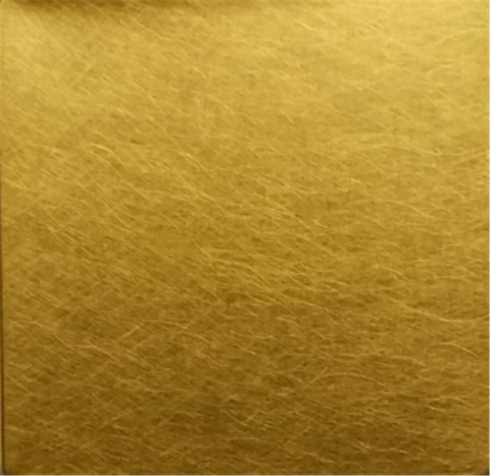 Gold vibration finish stainless steel sheet with a non-directional textured surface for artistic metal projects.