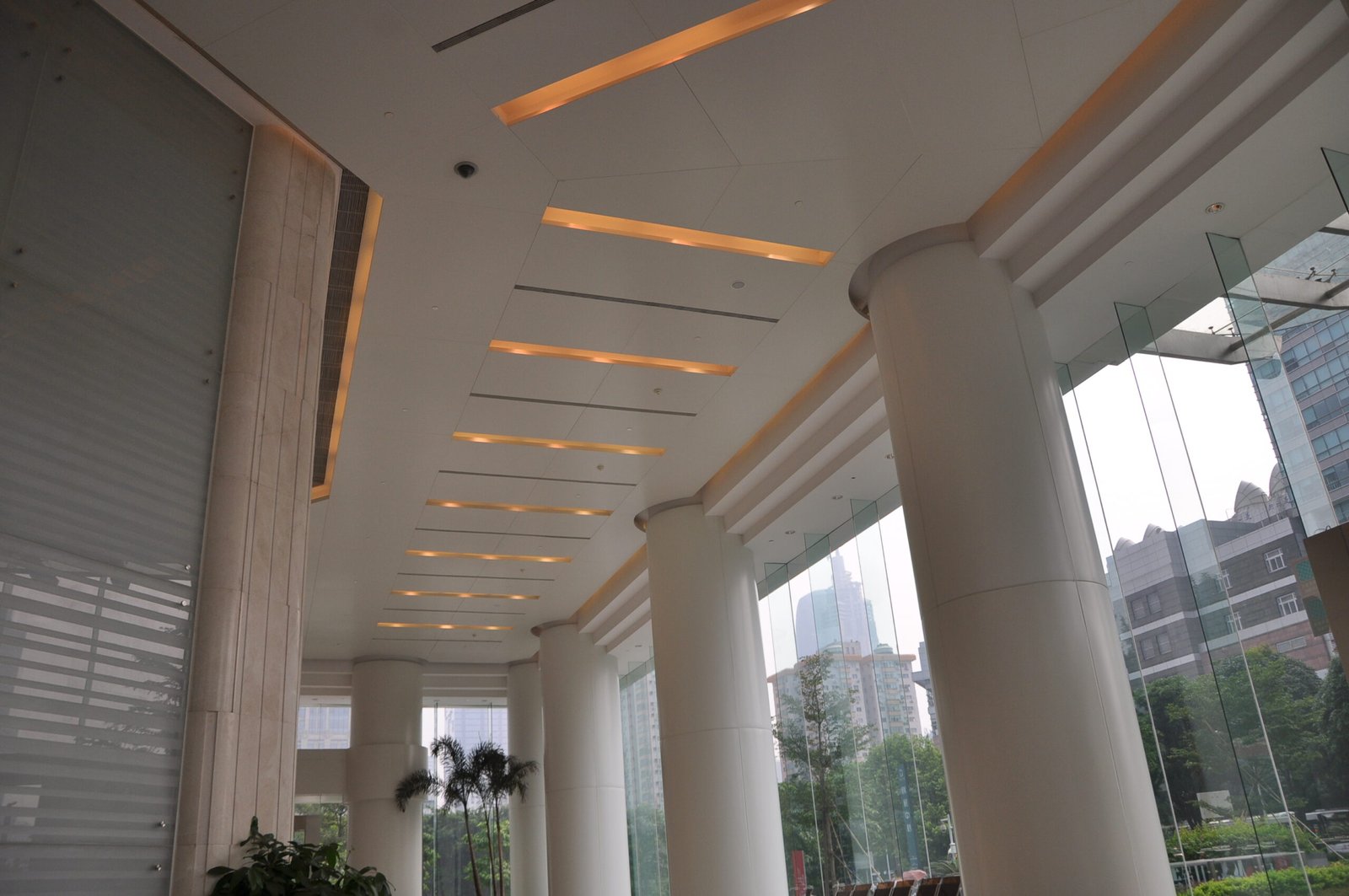 Luxury hotel lobby featuring custom PVDF coated panels for high-end interior wall cladding and column wraps.