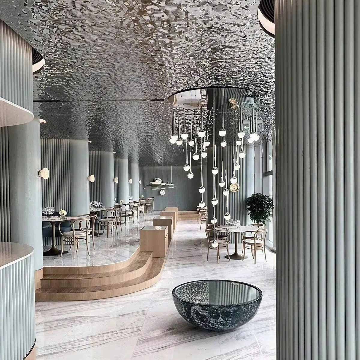 Close-up of medium wave texture on water ripple stainless steel sheets showing fluid and dazzling reflective effects