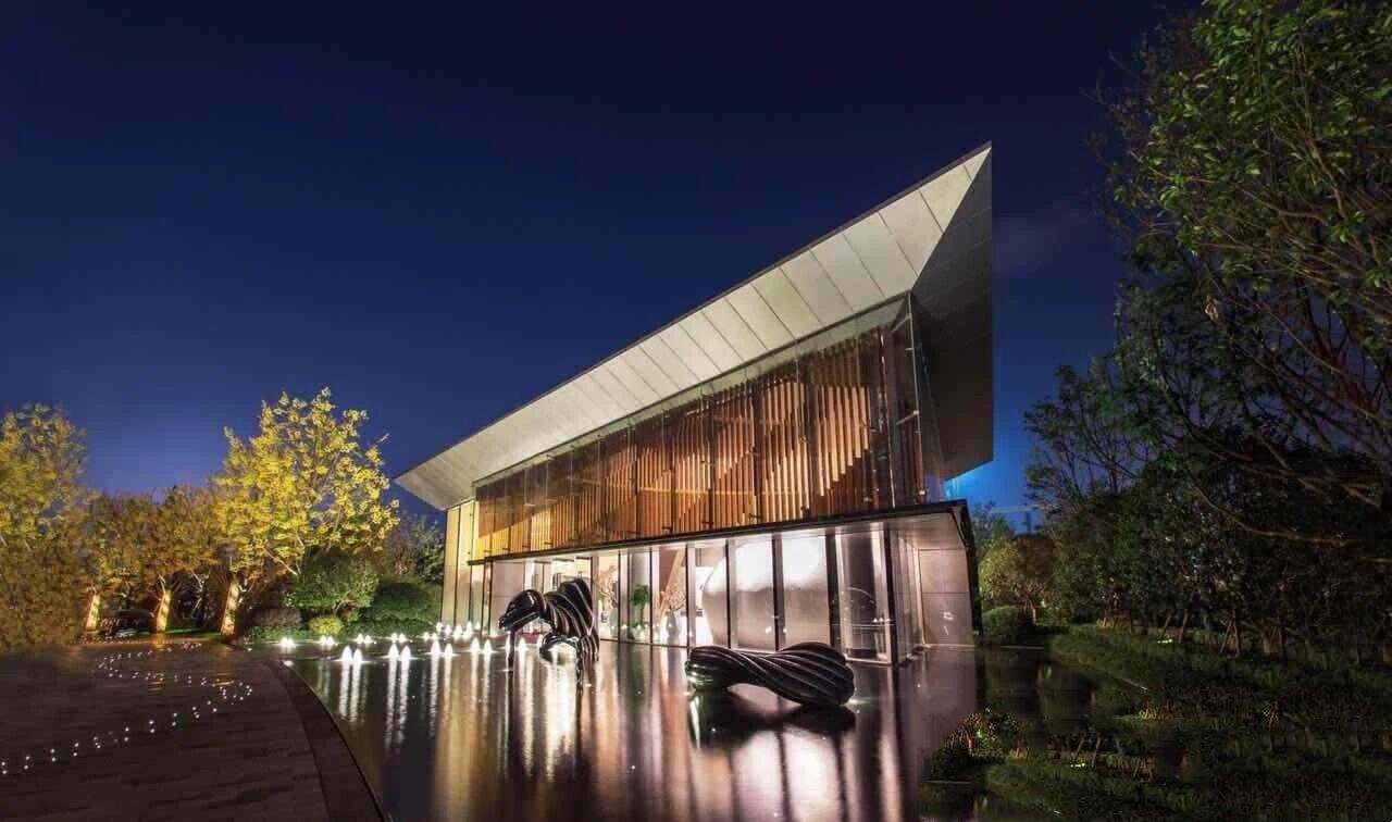 a high-end clubhouse utilizing Stainless Steel Custom Cladding Systems to create sharp geometric architectural lines.