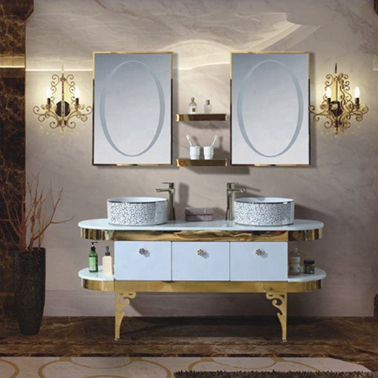 Traditional ornate PVD gold stainless steel vanity station with decorative laser-cut legs and matching bespoke metal mirror frames.