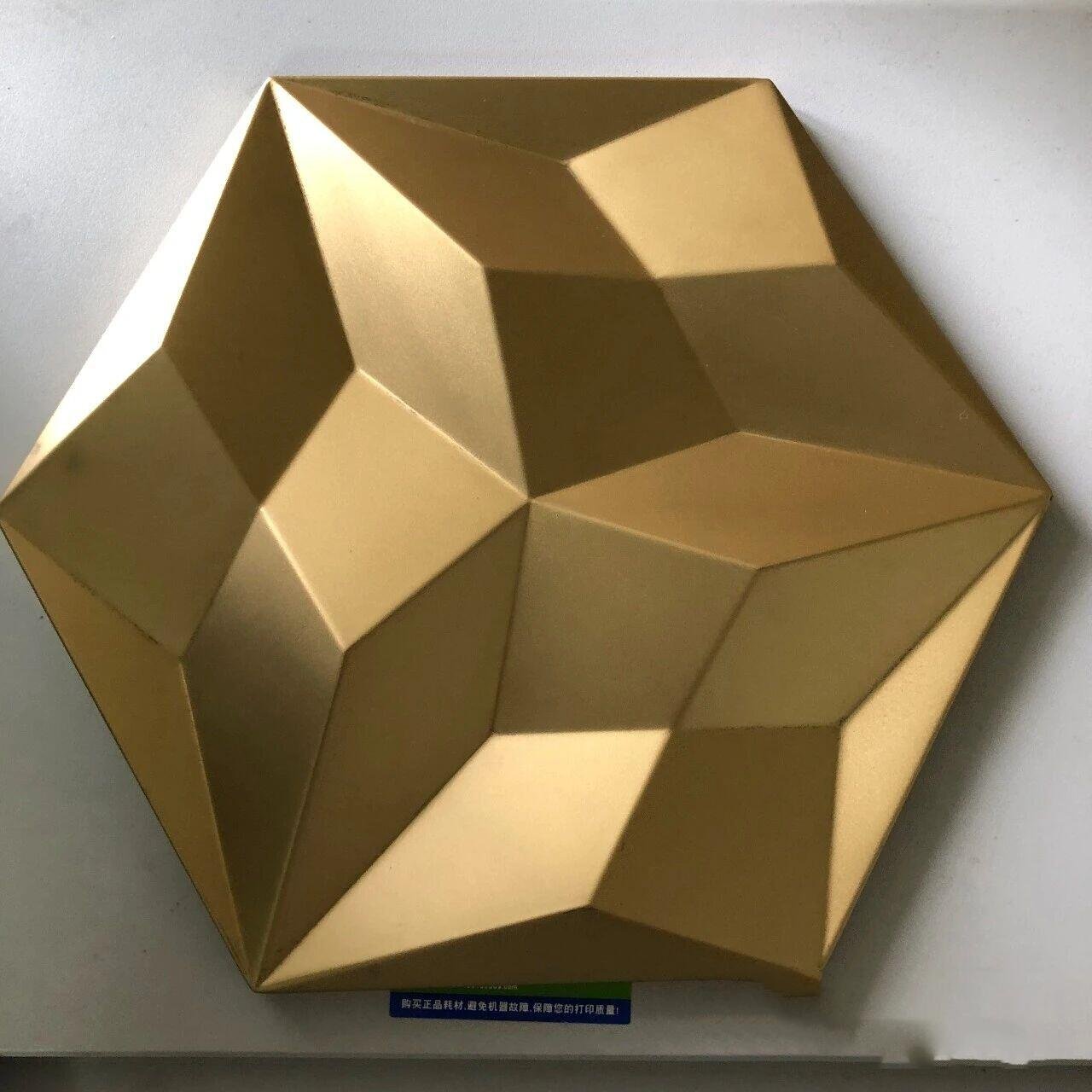 Sandblasted stainless steel sheets crafted into a luxurious gold 3D hexagonal decorative wall panel for high-end interior design.