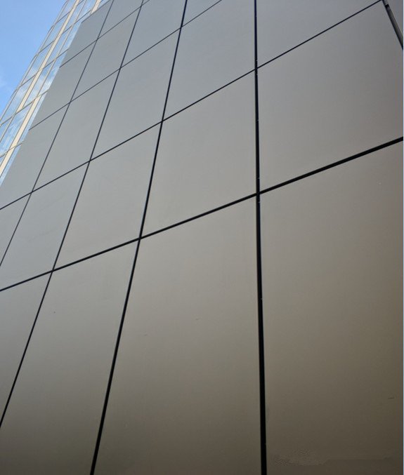 Sleek silver metallic wall panels demonstrating premium Anodized Aluminium Solutions for high-end interior wall cladding.