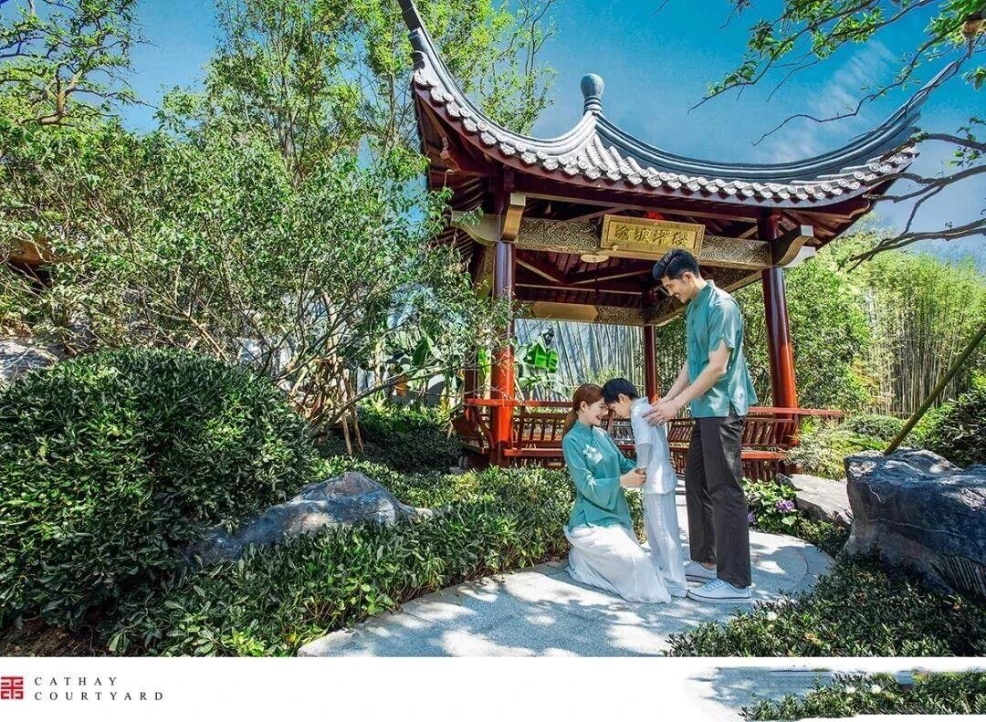 a red-painted Chinese style garden pavilion (gazebo)made of metal and wood