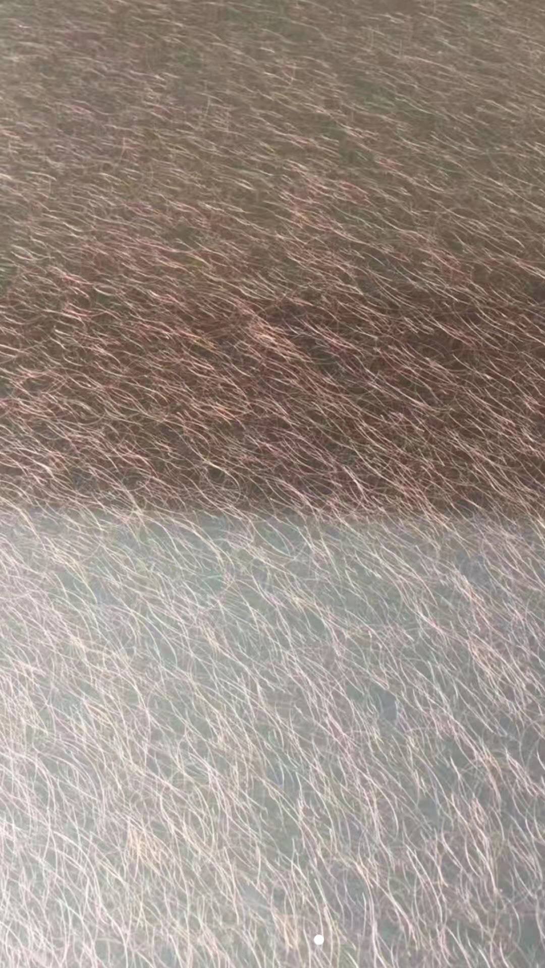 Vibration finish stainless steel panels in copper and bronze tones, featuring a scratch-resistant surface ideal for high-traffic commercial spaces