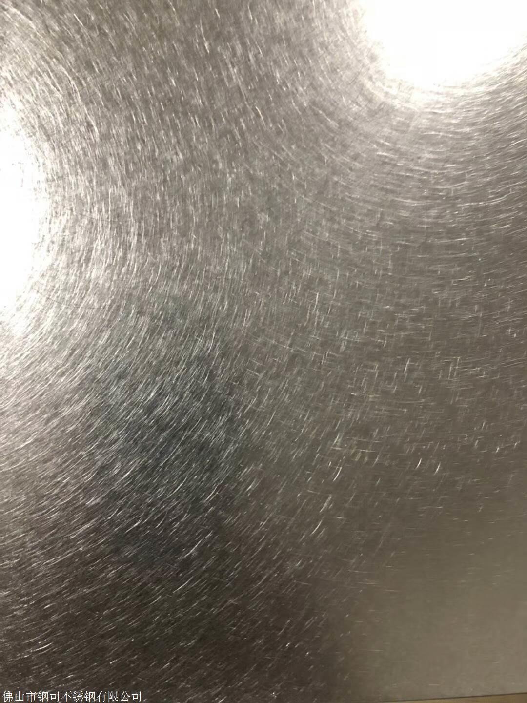 Vibration finish stainless steel close-up texture showcasing the uniform non-directional finish for decorative wall panels and cladding.