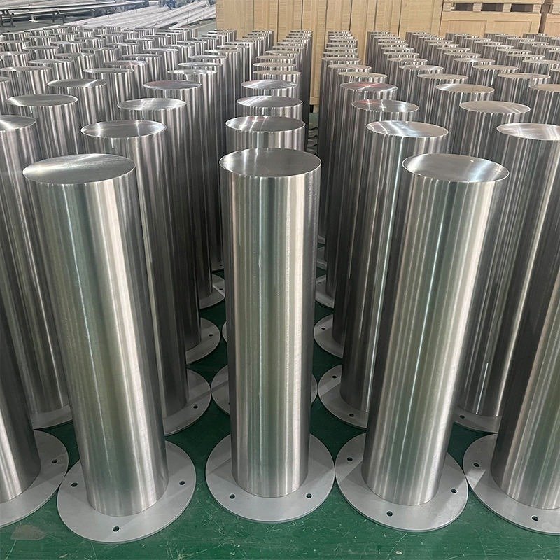 Bulk inventory of premium 316 and 304 grade stainless steel fixed bollards at the XYC Metalworks factory, engineered to meet ISO and ASTM standards for structural integrity.