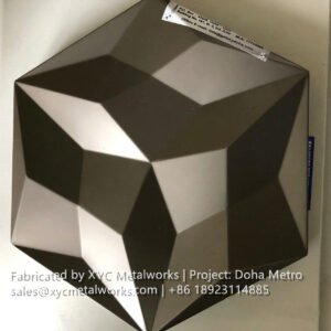 Individual sample of a bronze-finished 3D geometric metal panel, manufactured by XYC METALWORKS for Doha Metro.