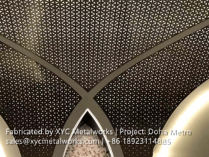 Close-up of bespoke perforated metal ceiling panels with geometric patterns, supplied by XYC METALWORKS for Doha Metro