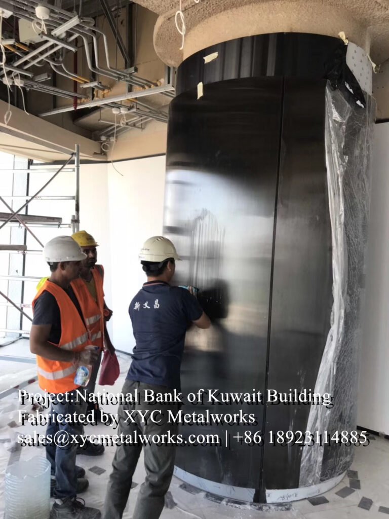 installing-curved-mirror-black-column-cladding-nbk