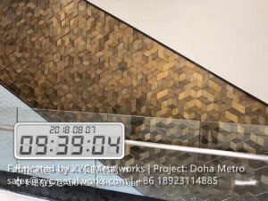 Close-up of the signature gold 3D hexagonal wall feature by XYC Metalworks, a hallmark of the Doha Metro’s unique interior design.